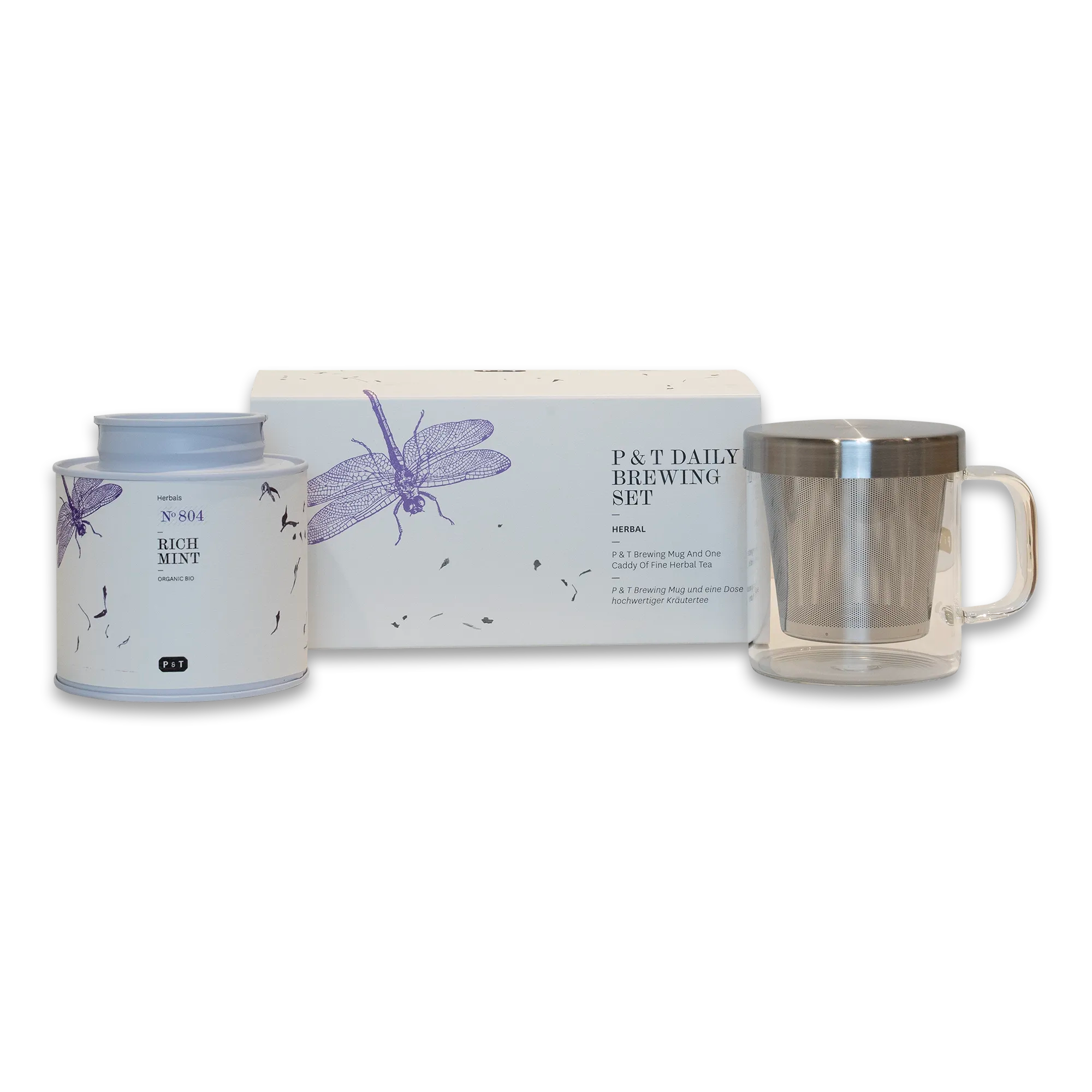 Weißer Teebehälter mit Kräuterillustration und 'RICH MINT' neben P & T Daily Brewing Set und Glasbecher mit Infuser